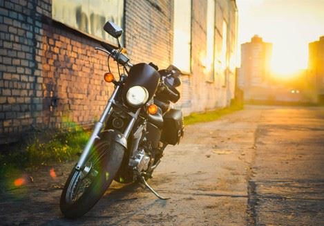 Motorcycle Parked In An Alley