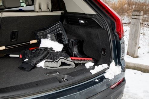 winter survival gear in trunk of car
